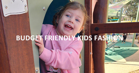 a cute girls in a happy pose wearing krazebear outfit, budget friendly kids fashion.